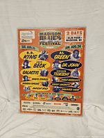 Front view of mounted 2003 Madison Blues Festival poster featuring artists like B.B. King, Al Green, Jeff Beck, and others.