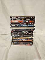 Photo of stacked DVD cases featuring titles in the psychological thriller genre