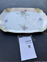 Full view of the vintage porcelain serving tray showing floral design, gold accents, and intact overall condition.