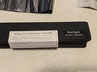 Kershaw Task Force Blade Trader 1099TF original case with label showing model and product info.