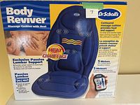 Original packaging box of Dr. Scholls Body Reviver Massage Cushion with Heat showing product features and branding.