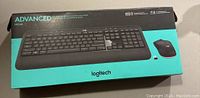 Box front showing Logitech MK540 Advanced wireless keyboard and mouse combo in black color with USB receiver shown.