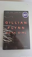 Front cover of Gone Girl hardcover showing title, author, and 30% discount sticker
