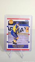 Front side of Mats Sundin 1990 NHL Prospect rookie card showing player in Quebec Nordiques uniform on ice.