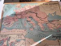 Close-up showing the map section covering parts of Europe and the Near East with historical markings and routes depicting the Crusades.