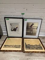 Photo of four framed prints arranged upright against white brick wall, showing various print themes and frame styles.