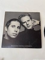 Front album cover featuring black and white photo of Simon & Garfunkel with album title Bookends.
