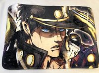 Close-up of the anime character on the bath mat, showing detailed print and colors.