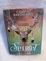 Front of sealed box with deer artwork and title, showing brand and description of deck