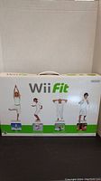 Front view of the Wii Fit box showing the product name and exercise pose illustrations