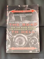 Front cover of the book showing title, author names, and motorcycle image.