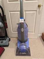 Front view of Hoover carpet shampoo machine showing overall condition and design.