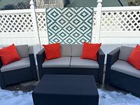 Full set: loveseat, two armchairs, coffee table, cushions, accent pillows, rug