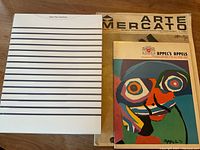 Overview of three art books showing covers and condition