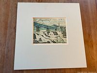 Matted aquatint print with visible full mat and artwork in center, showing "Thaw Waters" scene of bridge and river in winter.