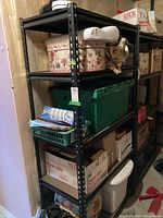 Full shelving unit showing its height, width and depth with various items stored (not included).