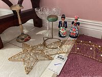 Overall view of lot items including hat stands, figurines, wire star, ring boxes, and one crystal candy bowl