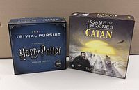 Closed game boxes for Harry Potter Trivial Pursuit Ultimate Edition and Game of Thrones Catan, showing box art and branding.