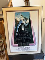 Full view of the framed vintage print depicting the Museum Train steam locomotive with mountain backdrop, showing overall condition and framing.