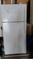 Front view of closed refrigerator