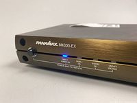 Front view of Panamax M4300-EX showing power button, LED status indicators labeled BANK 1 ALWAYS ON, BANK 2 ON, WIRING OK, UNSAFE VOLTAGE