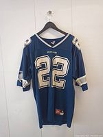 Front view of dark blue Emmett Smith Dallas Cowboys jersey with number 22
