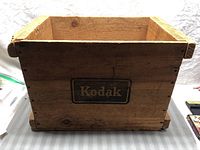 Side view of the wooden crate showing full Kodak logo and general condition.