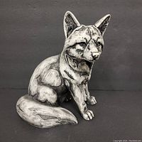 Front view of a lightweight resin fox statue painted in monochrome colors, showing detailed facial features and fur texture.
