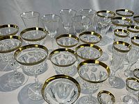 Full arrangement of glasses including front row sherry and water glasses