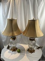 Full view of both lamps side by side with shades and size reference apple