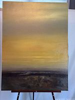 Full front view of the painting on easel