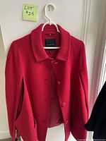 Front view of red Talbots wool jacket showing collar, buttons, and overall condition.