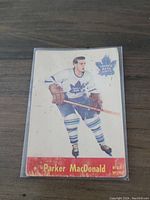 Front view of the 1955-56 Parkhurst Parker MacDonald hockey card showing the player in Toronto Maple Leafs attire.