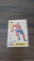 Front side of the 1958-59 Parkhurst hockey card featuring Albert Langlois in Montreal Canadiens uniform with card number 5.