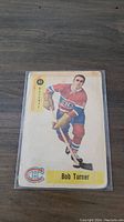 Front of the 1958-59 Parkhurst Bob Turner hockey card showing him in Montreal Canadiens uniform holding a hockey stick, card number 40.
