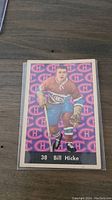 Front photo of the 1961-62 Parkhurst Bill Hicke hockey card number 38 showing player image and Montreal Canadiens logos background.