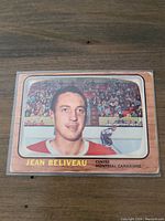 Front of the 1966-67 Topps Jean Beliveau hockey card showing player portrait and team.