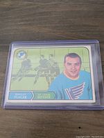 Front side of 1968-69 Barclay Plager hockey card showing player portrait and action background in protective sleeve.