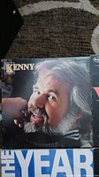 Album cover of a Kenny Rogers vinyl record showing a close-up portrait of Kenny Rogers with white hair and beard.