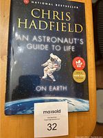 Front cover of the book showing title, author, and space-themed cover art.