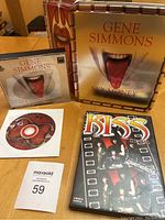 Image showing the 5-CD box set cover with large tongue artwork, 2-song CD, and KISS Unauthorized DVD.