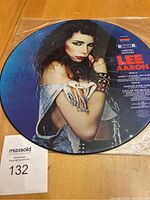 Front image of the Lee Aaron limited edition picture disc showing the artist and record details.