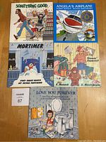 All five children's books by Robert Munsch, laid flat showing front covers.