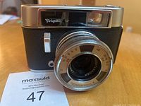 Front view of the Voigtlander Dynamatic camera showing lens, shutter, and front body condition.