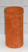 Full view of terra cotta cylindrical wine cooler showing shape and design