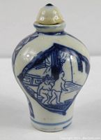 Front and one side view showing detailed blue underglaze hand-painted traditional scene with human figures and architecture.