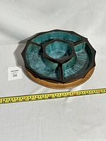 Blue Mountain Pottery 5-piece lazy Susan chip and dip set with ceramic sections in green glaze sitting on wooden base, shown from above with tape measure indicating diameter about 14 inches.