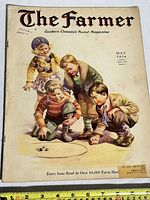 Front cover of The Farmer magazine showing children playing marbles, dated May 1934, with a measuring tape for scale.