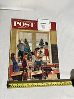 Photo of the full magazine cover showing children decorating classroom windows with Christmas imagery, measuring about 12.5 inches in height.