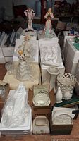 Overview of religious porcelain figures and other Lenox items including boxed pieces
